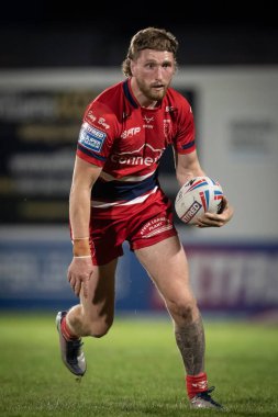 Ethan Ryan #23 of Hull KR runs with the ball during the game 