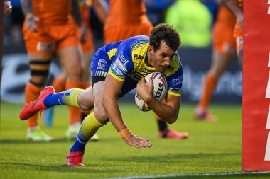 Stefan Ratchford #1 of Warrington Wolves goes over for his 100th Career try