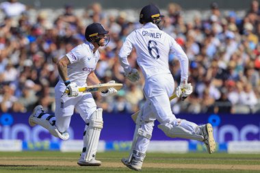 Ben Stokes and Zac Crawley of England running between the wickets