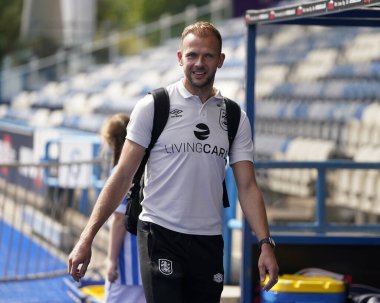 Jordan Rhodes #9 of Huddersfield Town arrives at the ground before the game