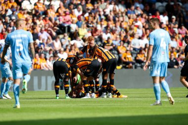 Vaughn Covil #49 of Hull City goes down injured