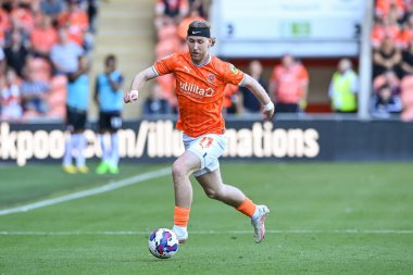 Josh Bowler #11 of Blackpool makes a break with the ball
