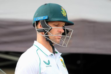 Sarel Erwee of South Africa comes out for the start of play