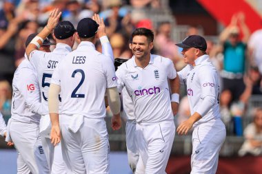 James Anderson of England celebrates taking the wicket of Dean Elgar of South Africa 