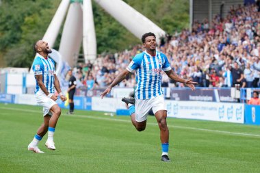 Tino Anjorin #8 of Huddersfield Town celebrates scoring his sides opening goal to go 1-0 up early in the first half