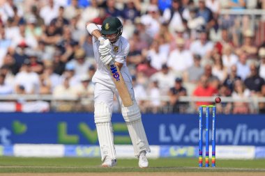 Sarel Erwee of South Africa catches an edge and is out caught by Ben Foakes of England off the bowling of Ollie Robinson of England for 25 runs