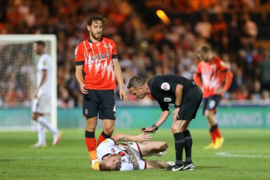 Oliver McBurnie #9 of Sheffield United lay stricken on the floor 