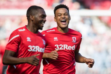 New signing Rodrigo Muniz #9 of Middlesbrough shares a joke with his new team mate during the pre match warm up 