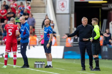 Chris Wilder manager of Middlesbrough complains to the forth official after the challenge from Ben Cabango #5 of Swansea City 