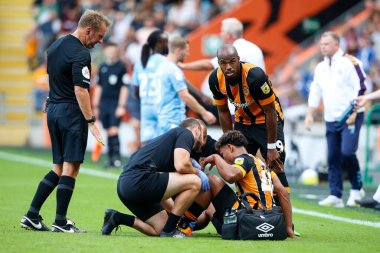 Vaughn Covil #49 of Hull City gets treatment on the pitch