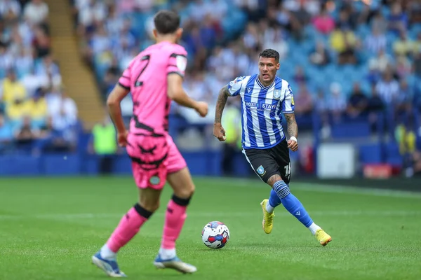 Marvin Johnson #18 of Sheffield Wednesday runs with the ball