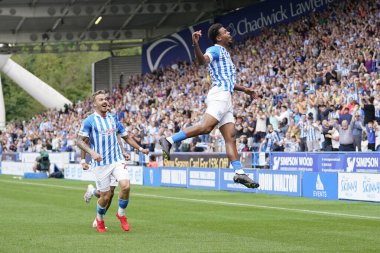 Tino Anjorin #8 of Huddersfield Town celebrates scoring his sides opening goal to go 1-0 up early in the first half