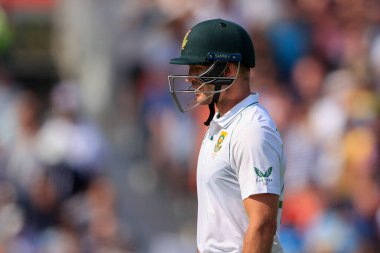 Sarel Erwee of South Africa is out for 25 runs and walks back to the pavilion