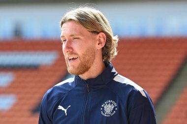 Josh Bowler #11 of Blackpool arrives at Bloomfield Road