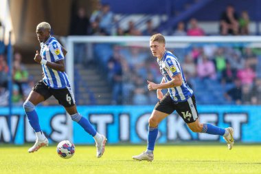 George Byers #14 of Sheffield Wednesday runs with the ball 