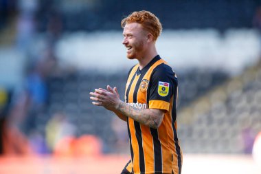 Ryan Woods #15 of Hull City applauds fans after the game