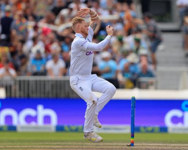 Ben Stokes of England comes in to bowl
