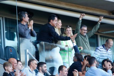 Acun Ilicali, owner of Hull City high fives a fan
