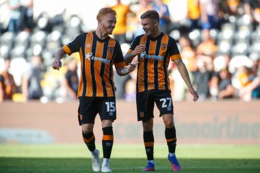 Ryan Woods #15 of Hull City and Regan Slater #27 of Hull City celebrate winning the game