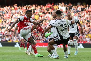 Gabriel Jesus #9 of Arsenal shoots under pressure from the Fulham defence 