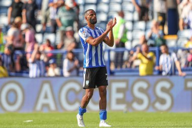 Michael Ihiekwe #20 of Sheffield Wednesday applauds the home fans after the final whistle