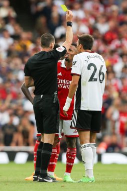 Gabriel Jesus #9 of Arsenal is shown a yellow card 