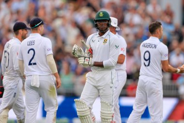 Kagiso Rabada of South Africa  walks back to the pavilion as he is bowled out by James Anderson of England for 2 runs