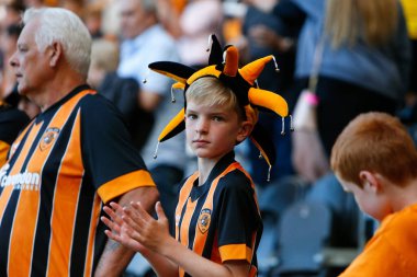A fan of Hull City claps at the final whistle