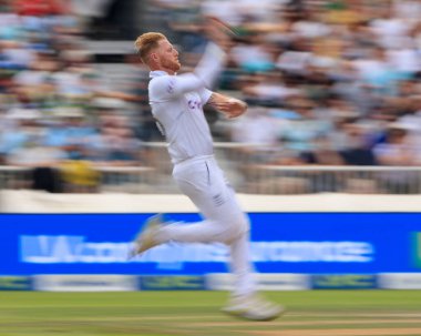 Ben Stokes of England comes in to bowl