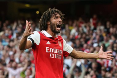 Mohamed Elneny #25 of Arsenal celebrates as Gabriel #6 of Arsenal scores to make it 2-1