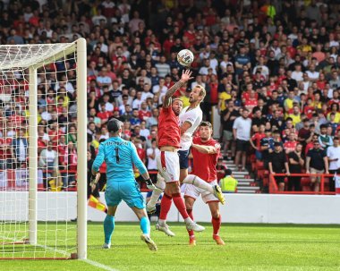 Steve Cook #3 of Nottingham Forest handles the ball, penalty given by referee Craig Pawson  