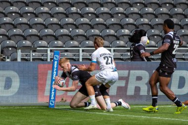 Harvey Barron of Hull FC goes over for a try and makes the score 4-0 during the first half 