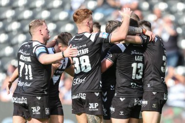 Jordan Lane #13 of Hull FC celebrates his try 