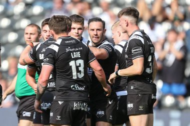 Jordan Lane #13 of Hull FC celebrates his try 