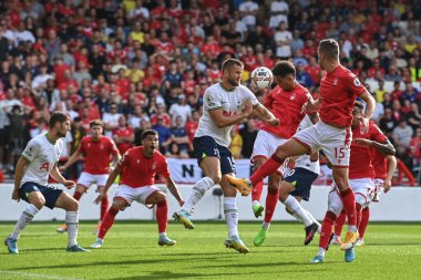 Brennan Johnson #20 of Nottingham Forest heads on goal 