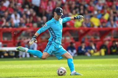 Dean Henderson #1 of Nottingham Forest clears the ball 