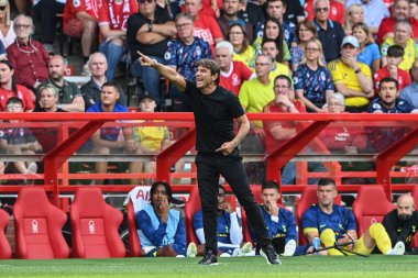Antonio Conte manager of Tottenham Hotspur gives his team instructions 