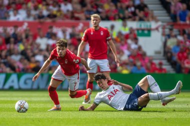 Neco Williams #7 of Nottingham Forest beats Son Heung-Min #7 of Tottenham Hotspur to the ball