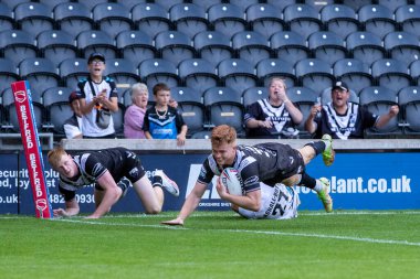 Ellis Longstaff of Hull FC goes over for a try and makes the score 28-6 during the second half 