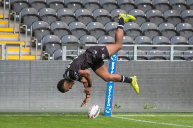 Mitieli Vulikijapani #25 of Hull FC goes over for a try and makes the score 22-0 during the first half 