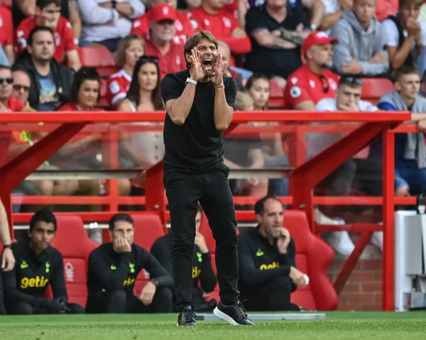 Antonio Conte manager of Tottenham Hotspur reacts during the game