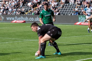 Jordan Lane #13 of Hull FC goes over for a try and makes the score 32-6