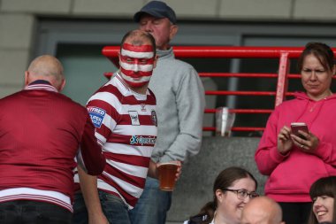 A Wigan Warriors fan at todays game 