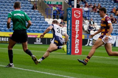 Matt Dufty #36 of Warrington Wolves touches down to score an early try 