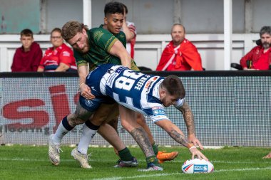 Ben O'Keefe #38 of Wigan Warriors goes over for a try and makes the score 32-10 during the second half 