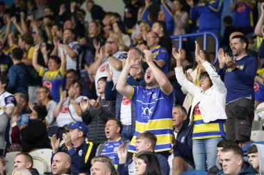 Warrington Wolves fans cheers their players after a late comeback fell just short