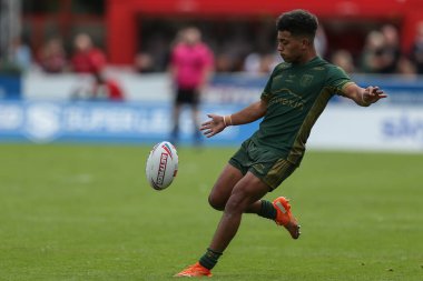 Phoenix Laulu-Togaga'e #29 of Hull KR puts a high kick up the pitch