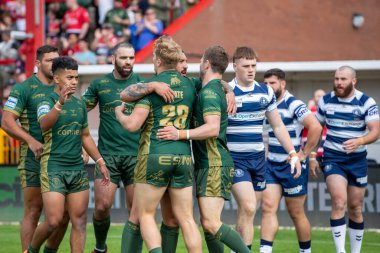 Will Tate #28 of Hull KR celebrates his try and makes the score 4-0 during the first half 