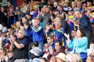 Warrington Wolves fans cheer on their sides valiant come back 