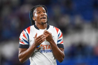 Gabriel Osho #32 of Luton Town Applauds the travelling supporters